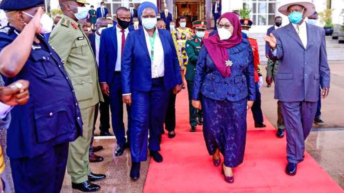 Yoweri Museveni and Samia Suluhu Hassan.