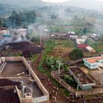 Debris engulfs buildings in Bushara village