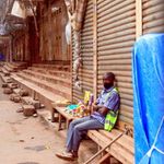 A lone trader with his merchandise