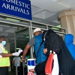 Passengers alight from a Kenya Airways Flight in Mombasa 