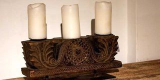 An antique candle holder