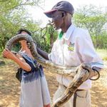  Baringo Snake Park with a snake handler