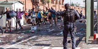 People flee Springfiled Park Mall in Durban 