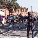 People flee Springfiled Park Mall in Durban 