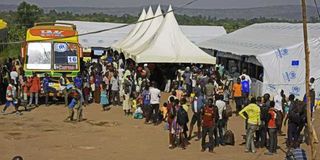 Refugees register at a camp in Uganda