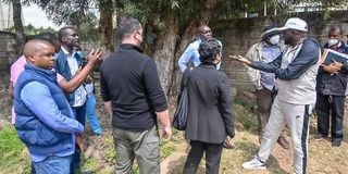 Kapseret MP Oscar Sudi (centre) with security officials from the Turkish Embassy 