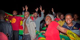 Supporters of Zambian president-elect Hakainde Hichilema celebrate.