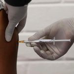 A man gets a Covid-19 vaccine.