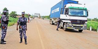 Uganda police officers man the Elegu Border point in northern Uganda.