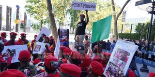 Uganda opposition supporters protest outside the United Nations headquarters in New York. 