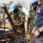 UN commanders in South Sudan inspect confiscated guns in 2014.
