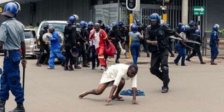 Police disperse protesters in Zimbabwe's capital Harare.