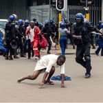 Police disperse protesters in Zimbabwe's capital Harare.
