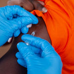 A health workers administer Covid-19 vaccine