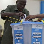 A man votes in a past election in Somalia.