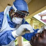 A medical worker takes samples for Covid-19 testing.