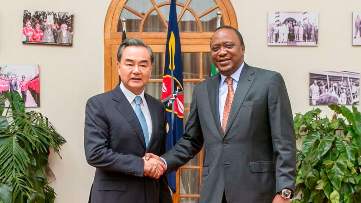 China's Foreign Minister Wang Yi with Kenyan President Uhuru Kenyatta.