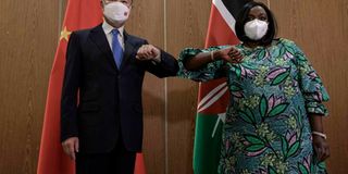 China's Foreign Minister Wang Yi and Kenyan Cabinet Secretary Raychelle Omamo.