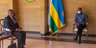 Burundian Minister Ezéchiel Nibigira with Rwanda's President Paul Kagame.