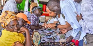 Miners display gemstones at Dan Mwazo Hall in Voi, Taita Taveta during the county’s gemstone expo.