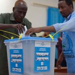 A man votes in a past election in Somalia.