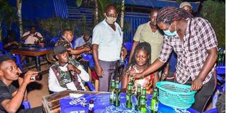 Patrons at the Gonzaga Munnamasaka Bar and Pork Joint.