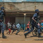 Uganda police disperse crowds in Kayunga town.