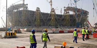 Workers at a stadium in Doha, Qatar.