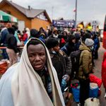 Refugees flee the conflict in Ukraine into eastern Poland on February 27, 2022.