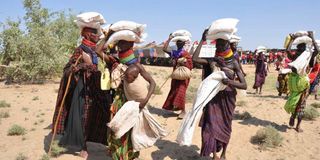 Residents of Turkana County receive relief food in 2011.