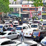 Motorists queue for fuel.