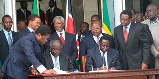 Mwai Kibaki and Raila Odinga.