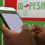 A client using mobile money service M-Pesa. 