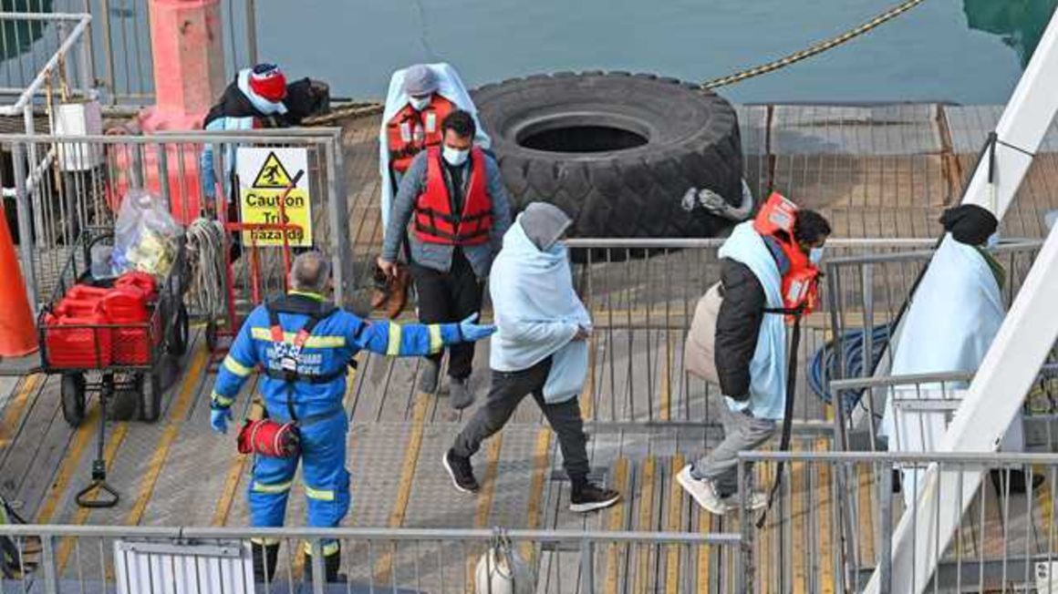 Migrants cross the English Channel.