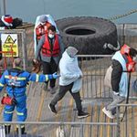 Migrants cross the English Channel.