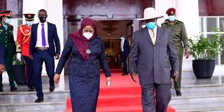 Presidents Samia Suluhu Hassan (Tanzania) and Yoweri Museveni (Uganda).