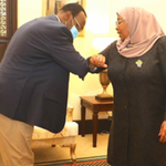Chadema leader Freeman Mbowe and Tanzanian President Samia Suluhu Hassan.