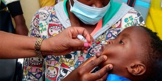 A child receives polio immunisation in Nairobi.