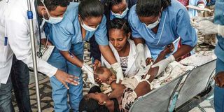 A woman receives treatment.