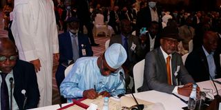 Chad and rebels sign peace deal in Qatar