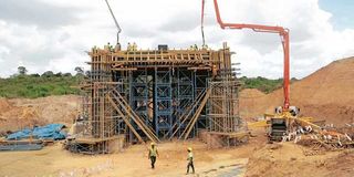 Engineers work on the Tanzanian SGR line at the Dar es Salaam station.