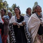 Women mourn victims of a massacre in Tigray.