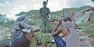 Suspected al Shabaab members are detained by Somali security forces.