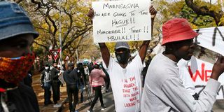 Protestors condemning corruption in Zimbabwe 