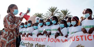 An environmental activist addresses a crowd 