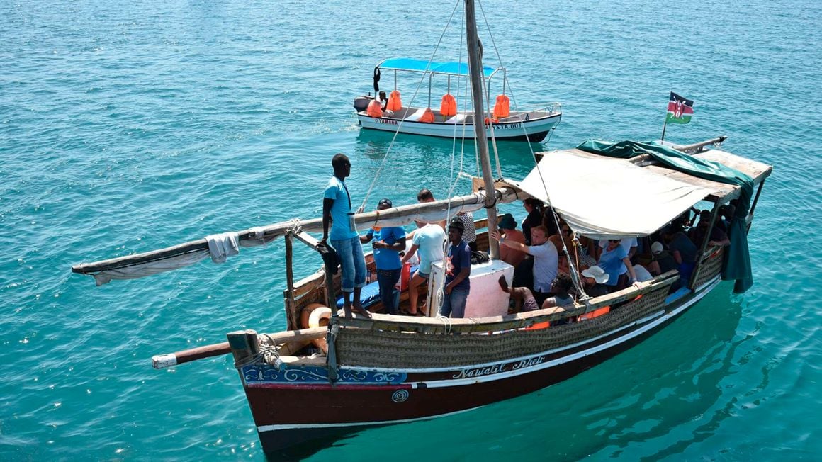 Tourists on a boat at Kenya's coast.