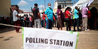 Voters queue to vote during Kenya's general election