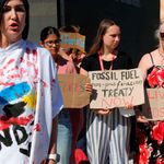 Activists against fossil fuel stage a protest during the COP27