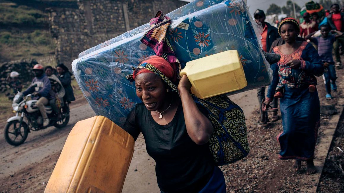 A woman fleeing from the fighting in DRC 