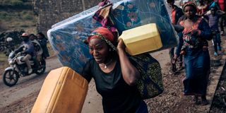 A woman fleeing from the fighting in DRC 